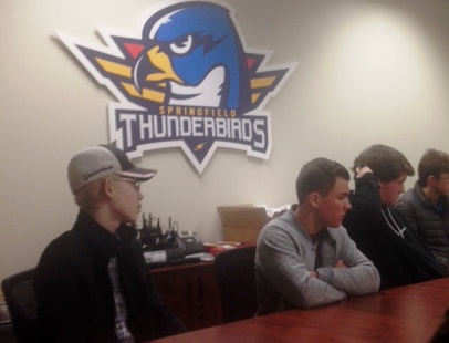 Students at Thunderbirds conference table