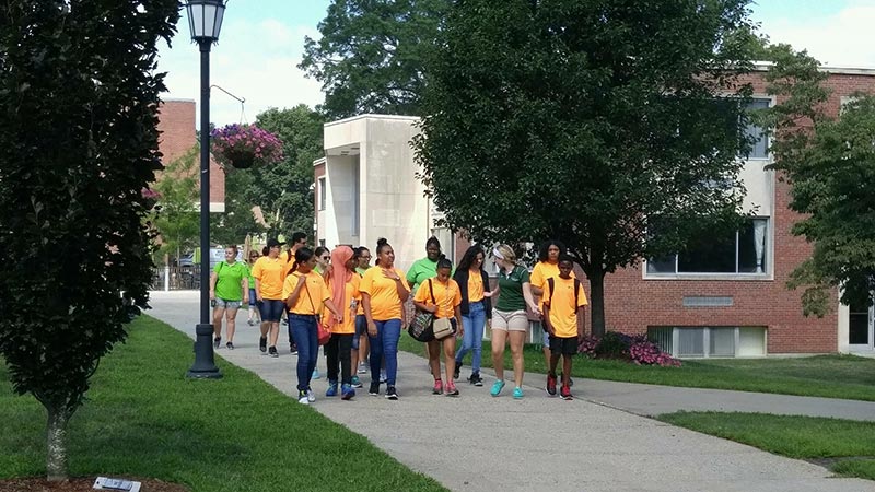 Bee Summer Program participants walking outside