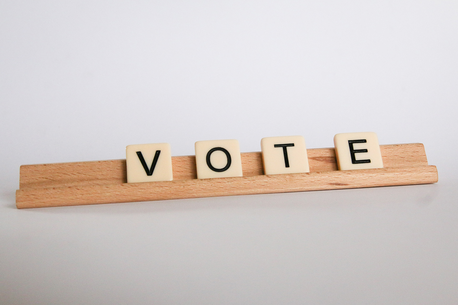 Scrabble VOTE tiles